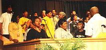 PART OF THE CHOIR AND ENSEMBLE GO THROUGH A NUMBER DURING REHEARSAL...